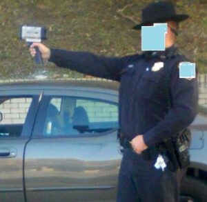 Police Officer with Radar Gun | Alexandria VA Traffic Ticket Lawyer